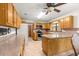 Classic kitchen featuring wood cabinets and stainless steel appliances at 2416 Se 15Th St, Ocala, FL 34471