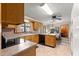 Bright kitchen with a cozy breakfast bar, complete with stainless steel appliances at 2416 Se 15Th St, Ocala, FL 34471