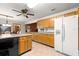 Open-concept kitchen and dining area with ample counter space and modern appliances at 2416 Se 15Th St, Ocala, FL 34471
