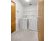 A compact laundry room with a washing machine and dryer at 2521 Nw 45Th Pl, Ocala, FL 34475