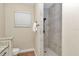 This bathroom features a tiled walk-in shower with modern fixtures and a window at 2525 Sw 7Th Ave, Ocala, FL 34471