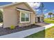 Charming exterior detail featuring stone accents, manicured landscaping and inviting walkway at 2525 Sw 7Th Ave, Ocala, FL 34471