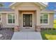 Inviting front entrance with stone pillars, a stylish door, and manicured landscaping, creating a warm welcome at 2525 Sw 7Th Ave, Ocala, FL 34471