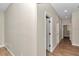 Hallway featuring wood-look tile flooring and neutral paint at 2525 Sw 7Th Ave, Ocala, FL 34471