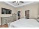 Main bedroom with dresser, walk-in closet, and attached bathroom at 2525 Sw 7Th Ave, Ocala, FL 34471