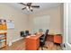 Office featuring desk, office chair, and wood-look tile flooring at 2525 Sw 7Th Ave, Ocala, FL 34471