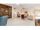 Spacious living room with built-in bookcase at 2608 Casso Ct, The Villages, FL 32162