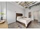 Bedroom with concrete floors and ensuite bathroom and closet at 302 Se Broadway St # 240, Ocala, FL 34471