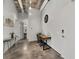 Modern kitchen features stainless steel appliances, a sleek island, and stylish seating, ideal for cooking and entertaining at 302 Se Broadway St # 240, Ocala, FL 34471