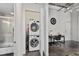 Efficient laundry space with stacked washer and dryer, conveniently located near the bathroom at 302 Se Broadway St # 240, Ocala, FL 34471