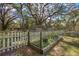 Outdoor garden with fencing at 3299 County Road 521, Wildwood, FL 34785