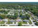 Aerial view of a Gathering friendly neighborhood with beautiful, mature trees at 3881 Se 61St Pl, Ocala, FL 34480