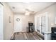 Bright dining area featuring wood-look floors, mini fridge, and French doors at 3881 Se 61St Pl, Ocala, FL 34480