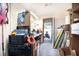 Functional garage space with workbench, storage, and convenient access to the outdoors at 3881 Se 61St Pl, Ocala, FL 34480