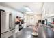 Kitchen with white cabinets, stainless steel appliances, and breakfast bar at 3881 Se 61St Pl, Ocala, FL 34480