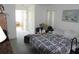 Cozy bedroom providing a private entrance to the bathroom and featuring lots of space for storage at 5391 Nw 19Th Pl, Ocala, FL 34482