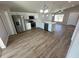 Open-concept kitchen featuring stainless steel appliances and ample counter space at 6638 Se 108Th Ln, Belleview, FL 34420
