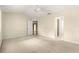 Large primary bedroom with neutral carpet and ceiling fan at 8532 Sw 65Th Court Rd, Ocala, FL 34476
