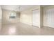 Bedroom with tile floors, ceiling fan, closet, and a window at 8532 Sw 65Th Court Rd, Ocala, FL 34476
