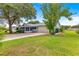This single-story home includes a side driveway and mature landscaping at 8532 Sw 65Th Court Rd, Ocala, FL 34476