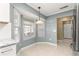 Kitchen nook featuring bright windows, white countertops, and modern lighting at 8532 Sw 65Th Court Rd, Ocala, FL 34476