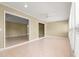 Expansive living room with tile floors, ceiling fan, and large window at 8532 Sw 65Th Court Rd, Ocala, FL 34476