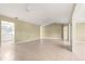 Bright, open-concept living space with a glimpse into the kitchen at 8532 Sw 65Th Court Rd, Ocala, FL 34476