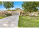 Charming single-story home with a well-manicured front yard and a two-car garage at 8710 Sw 91St St # E, Ocala, FL 34481