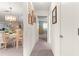 Hallway view leading to bedroom and dining room at 8710 Sw 91St St # E, Ocala, FL 34481
