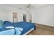 Light-filled bedroom with ensuite bathroom and walk-in closet, featuring light-colored floors at 8816 Sw 69Th Place Rd, Ocala, FL 34481