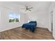 Minimal bedroom with light floors, large window, and calming natural light at 8816 Sw 69Th Place Rd, Ocala, FL 34481