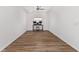 Bedroom with ceiling fan, wood-look flooring, and a window at 8816 Sw 69Th Place Rd, Ocala, FL 34481