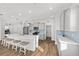 Bright open kitchen featuring an island with bar seating and an open floor plan at 8816 Sw 69Th Place Rd, Ocala, FL 34481