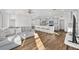 Living room boasts open layout, kitchen with breakfast bar, and stainless steel appliances at 8816 Sw 69Th Place Rd, Ocala, FL 34481