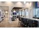 Clubhouse lounge with stylish seating, flat screen tv and snack bar at 8816 Sw 69Th Place Rd, Ocala, FL 34481