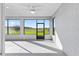 Bright screened-in patio with view of the green backyard at 8816 Sw 69Th Place Rd, Ocala, FL 34481