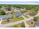 Aerial view of homes in the neighborhood with mature trees and landscaping at 8849 Sw 116Th Place Rd, Ocala, FL 34481