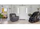 Bright foyer with a view of the front door and tile flooring, offering a grand entrance to the home at 8849 Sw 116Th Place Rd, Ocala, FL 34481