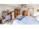 Large bedroom with a spacious layout, natural light, and carpet flooring perfect for relaxation at 8940 Sw 8Th St, Ocala, FL 34481