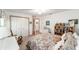 Comfortable bedroom with a closet and a view into the bathroom at 8940 Sw 8Th St, Ocala, FL 34481