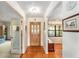 Welcoming foyer with tile flooring and glass paneled entry door at 8940 Sw 8Th St, Ocala, FL 34481