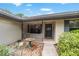 Inviting front porch with decorative details and a cozy entrance at 8940 Sw 8Th St, Ocala, FL 34481
