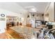 Kitchen with a large island, granite counters, and adjacent dining area at 8940 Sw 8Th St, Ocala, FL 34481