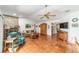 Spacious living room with tile floors, a fireplace, and lots of natural light at 8940 Sw 8Th St, Ocala, FL 34481