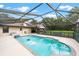 Backyard screened-in pool is perfect for enjoying the outdoors, and soaking up the Florida sunshine at 8940 Sw 8Th St, Ocala, FL 34481