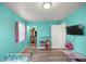 Vibrant bedroom with colorful walls, closet and entertainment at 9 Juniper Pass Trl, Ocala, FL 34480