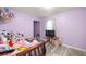 Cozy bedroom decorated with plush toys and modern TV at 9 Juniper Pass Trl, Ocala, FL 34480