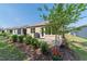 Backyard featuring a patio, a grill, and lush greenery, creating a private outdoor space at 9309 Sw 106Th Ave, Ocala, FL 34481