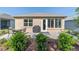 Backyard featuring a patio, a grill, and lush greenery, creating a private outdoor space at 9309 Sw 106Th Ave, Ocala, FL 34481