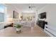 Bright and airy living space featuring wood-look flooring and neutral decor at 9309 Sw 106Th Ave, Ocala, FL 34481